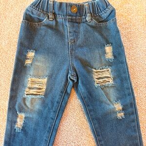 Distressed Blue Jeans